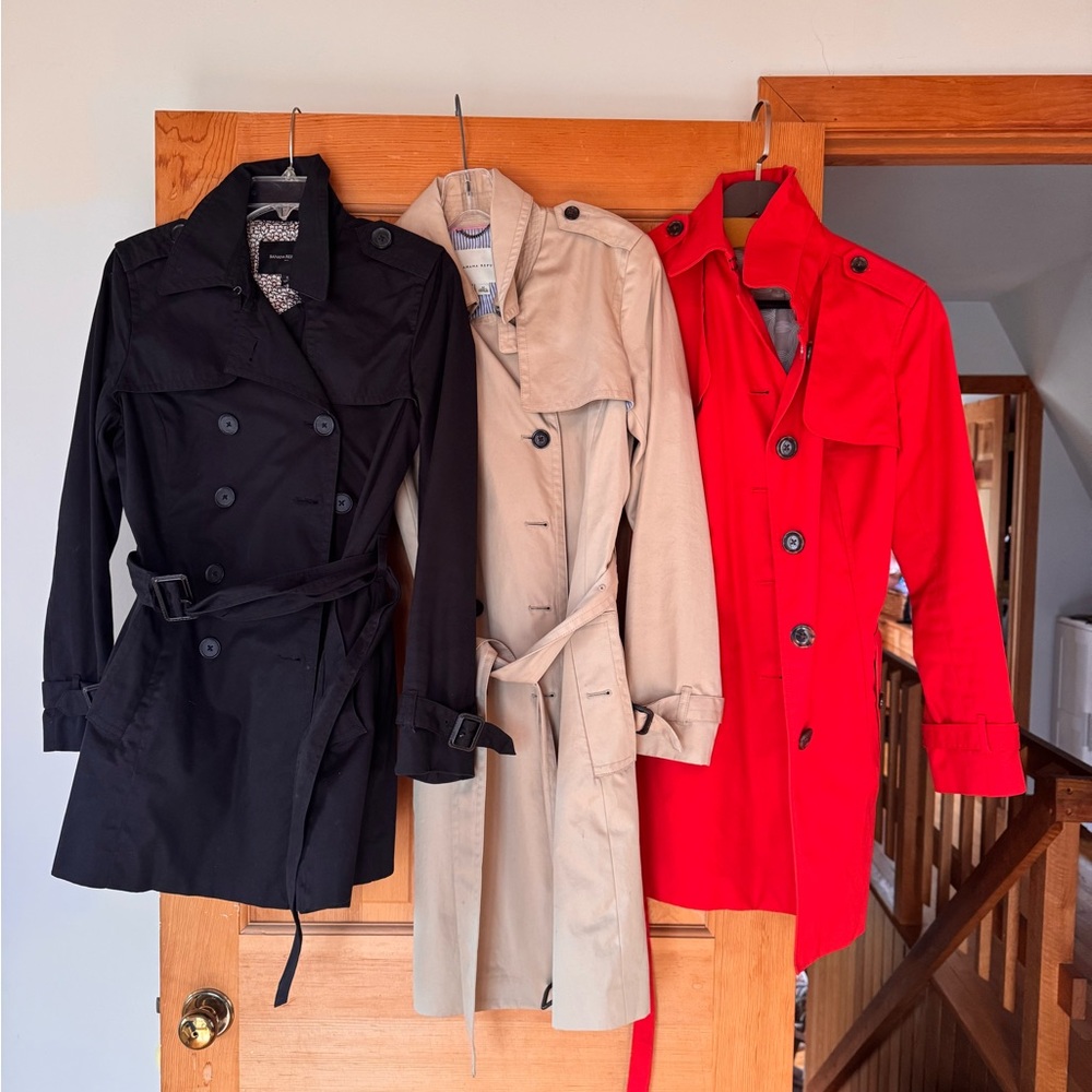 Three banana republic trenchcoats.
